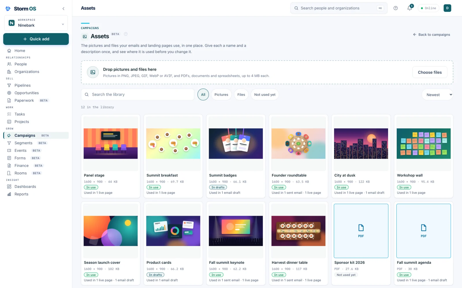 The Assets library with 12 items in a grid, pictures such as Panel stage, Summit breakfast, Summit badges, Founder roundtable, City at dusk and Harvest dinner table and two PDFs, each card showing its size and where it is used, from one live page to one sent email